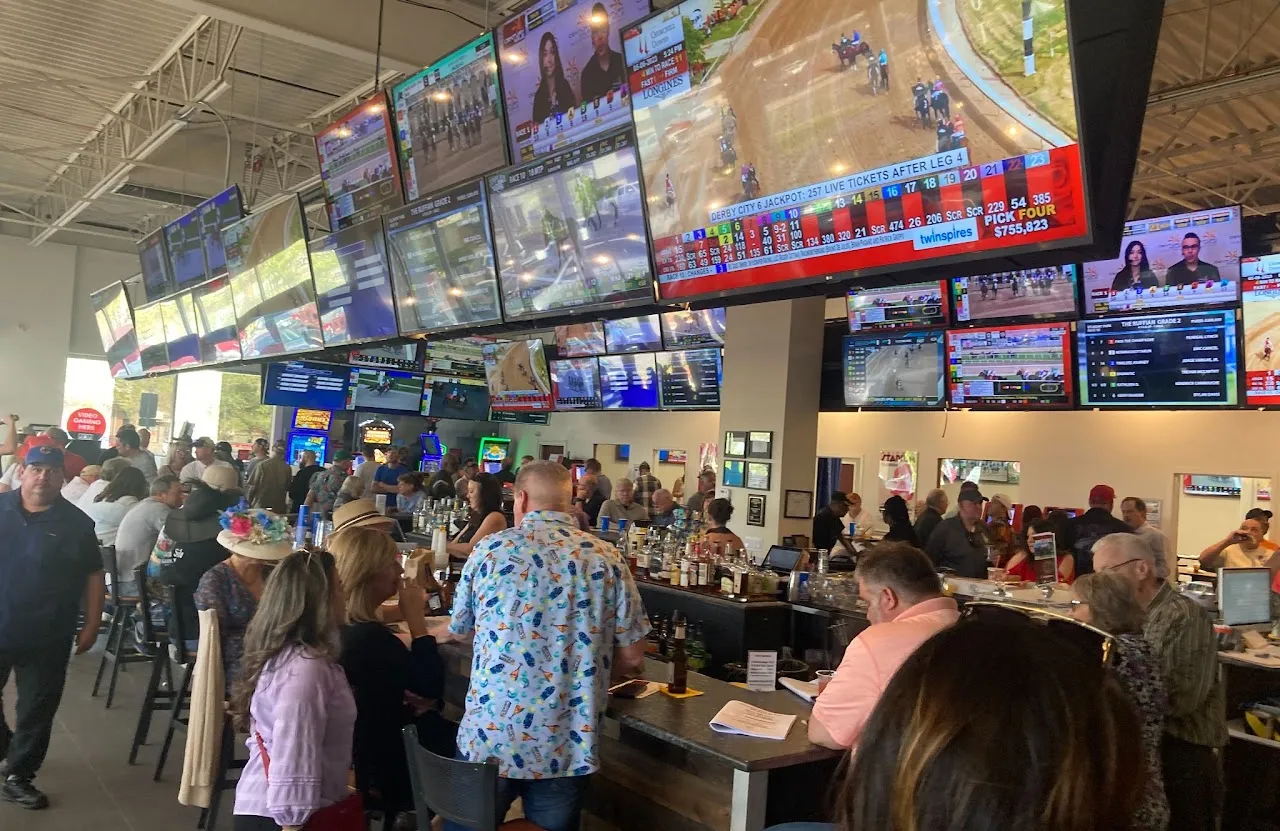 Black Eyed Susan Joliet flagship location with customers enjoying sports betting and gaming