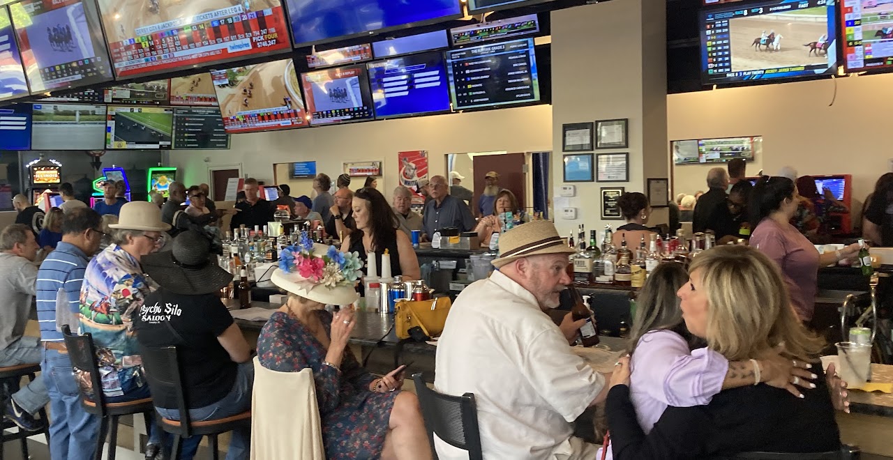 Black Eyed Susan Joliet OTB bar interior with horse racing decorations and derby celebration atmosphere